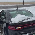 Drivers describe getting stuck in snowy conditions on Interstate 70 in Colorado