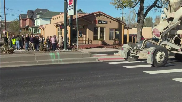 Denver celebrates completion of pedestrian safety improvement project on Federal Boulevard, business owner looks forward to future