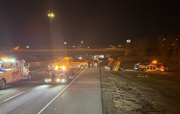 Excavator falls off trailer, causes delays on I-25 overnight