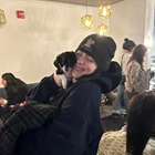 Billie Eilish snuggles with rescue puppy, pony before Denver concert