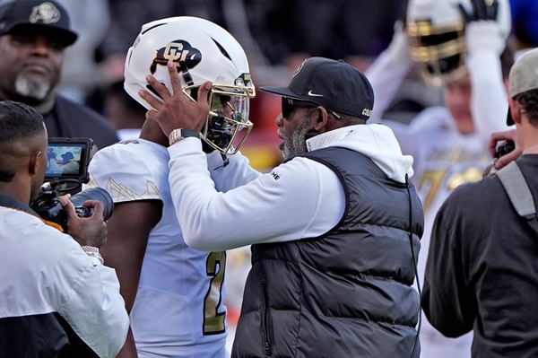 Devin Neal scores 4 times, Kansas beats No. 16 Colorado 37-21 as Buffs' Big 12 title hopes take hit