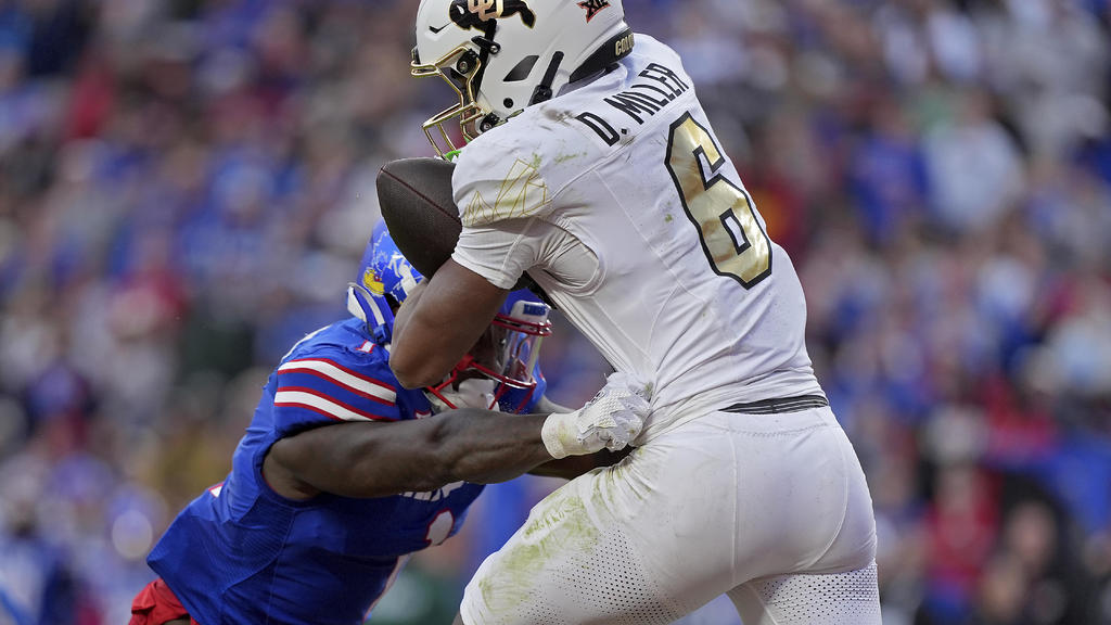 Kansas beats Number 16 Colorado 37-21 as Buffs' Big 12 title hopes take hit